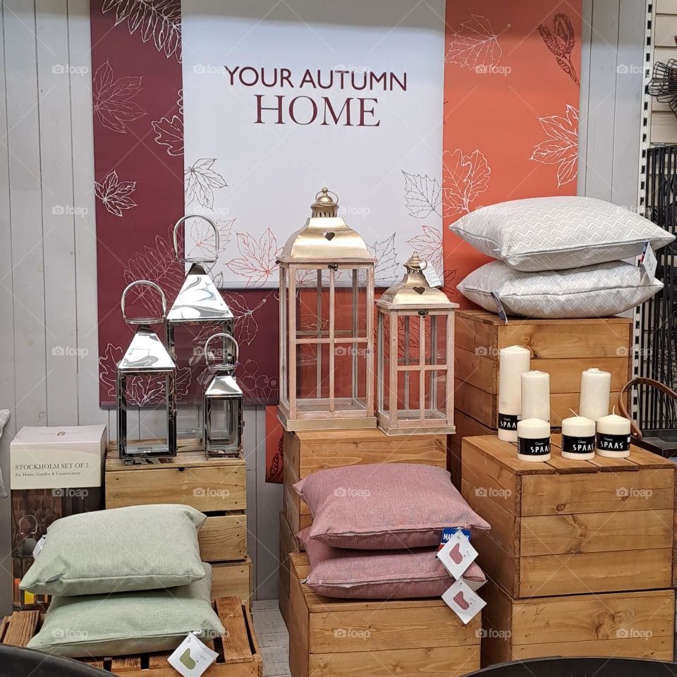 autumn shop homeware display, cushions lamps