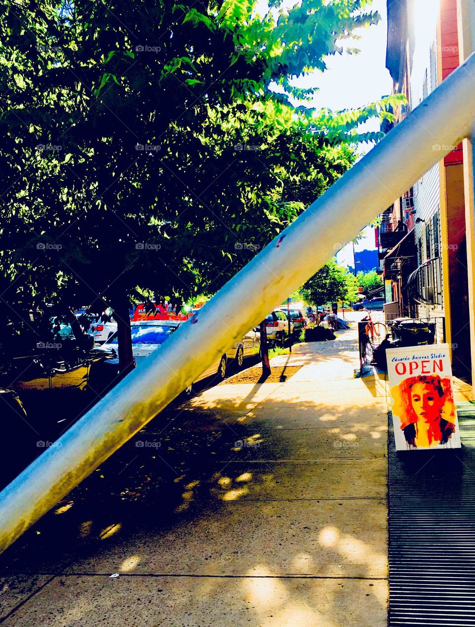 A view of 48th St off Vernon Jackson Ave in LIC, Queens, NY with a billboard advertising an art opening at a local gallery nearby. I washed my clothes at „Laundry City“ here on the block and noticed the sign. 2020. Hypnotic Productions