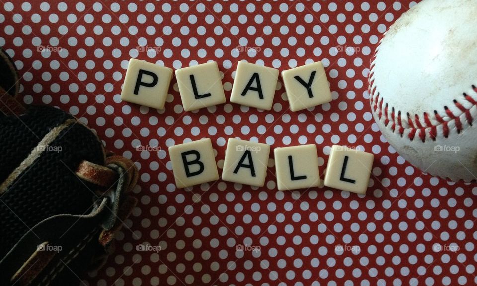 Play ball. Play ball made with letter tiles