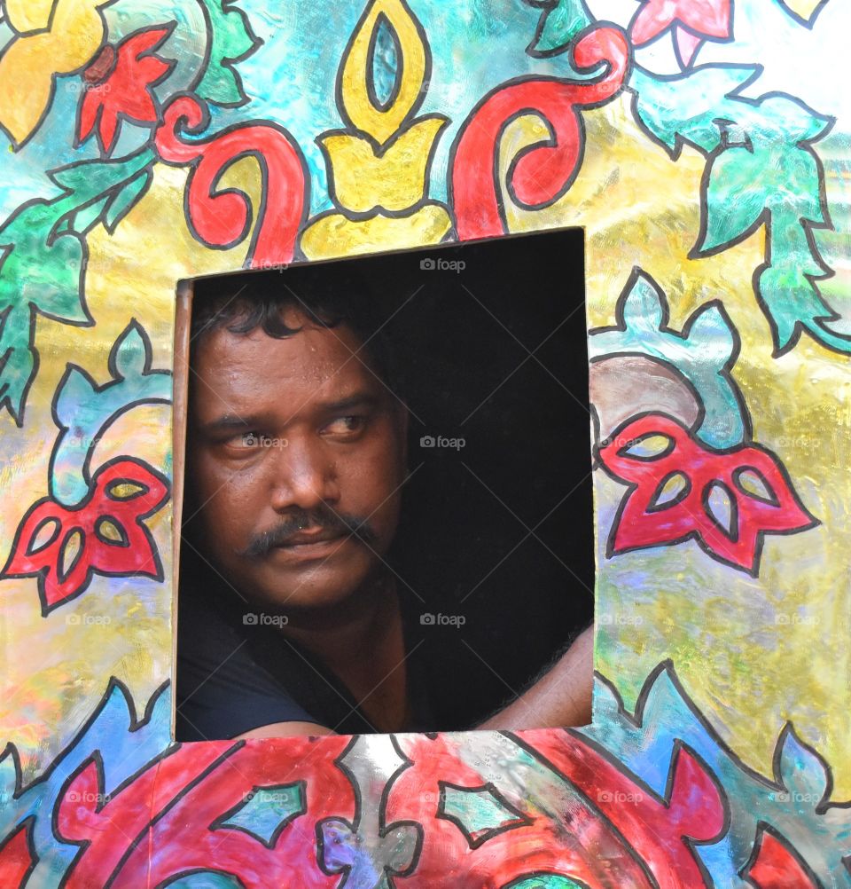 curious look from tiny colorful window....