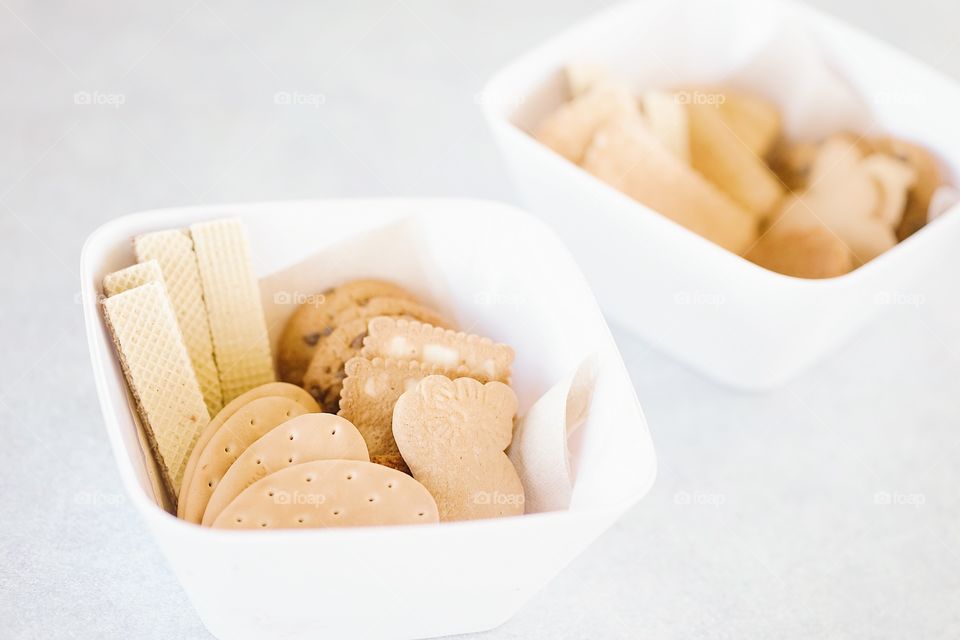 Cookies in bowl. Assorted cookies and chocolate wafers are served in bowl for morning break.