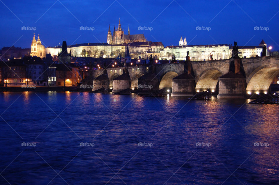 river bridge castle prague by sklarian