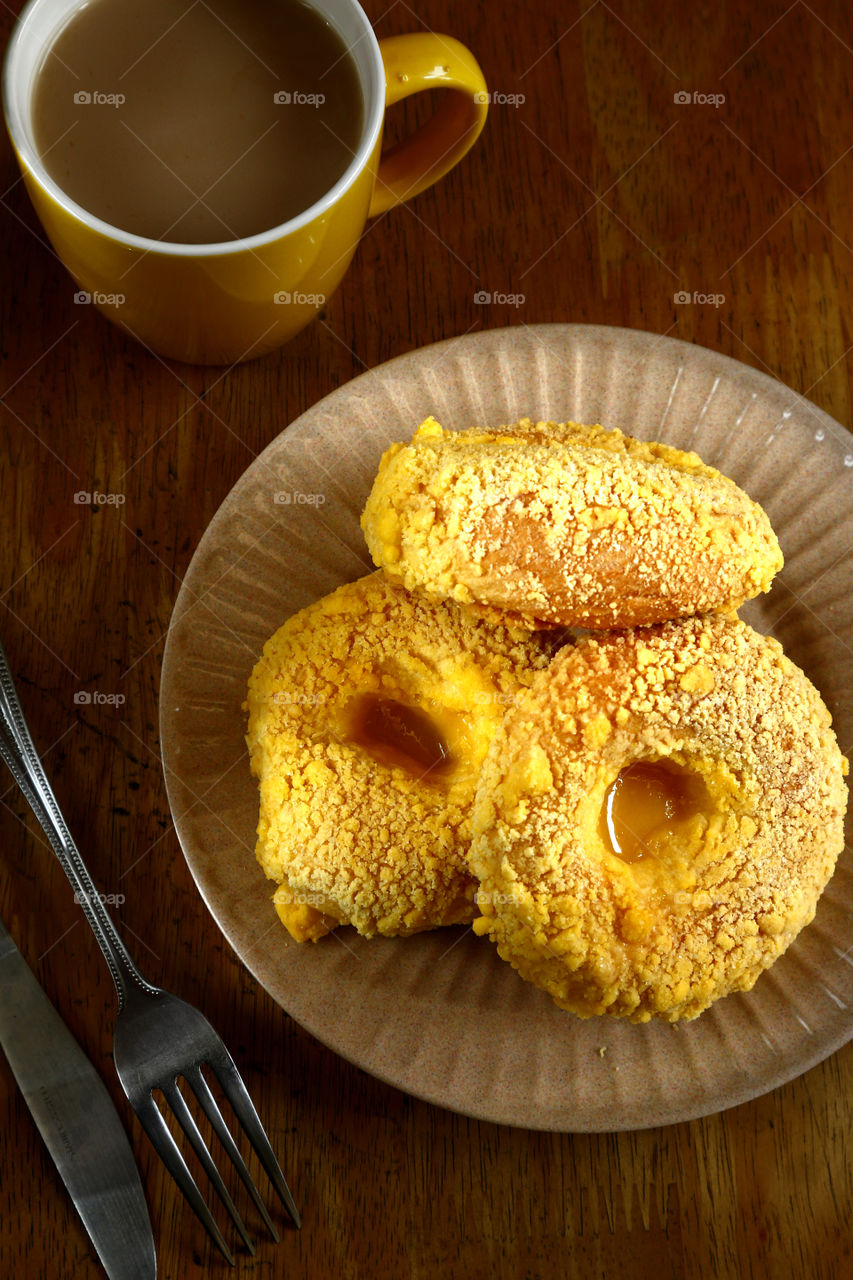 freshly baked cheese bread and amug of coffee