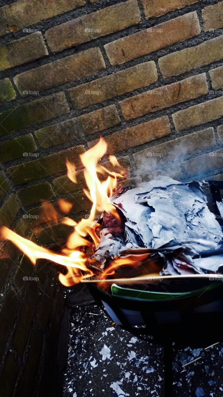 BURNING SCHOOLBOOKS