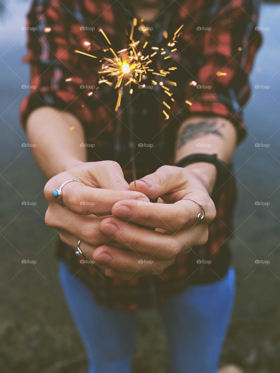 A girl holding up a sparkler