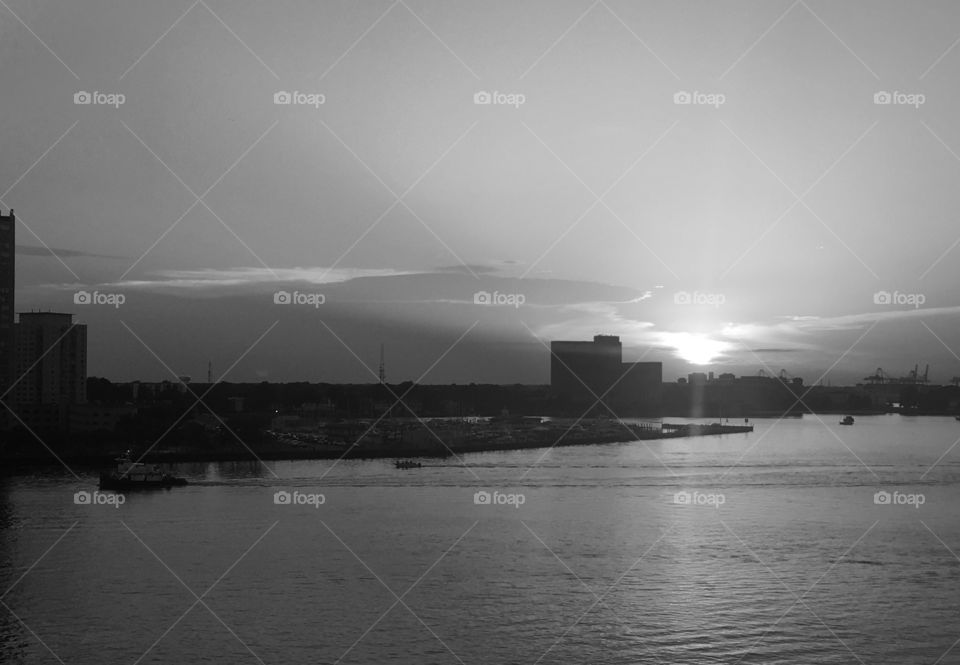 Sunset on the river in black and white. 
