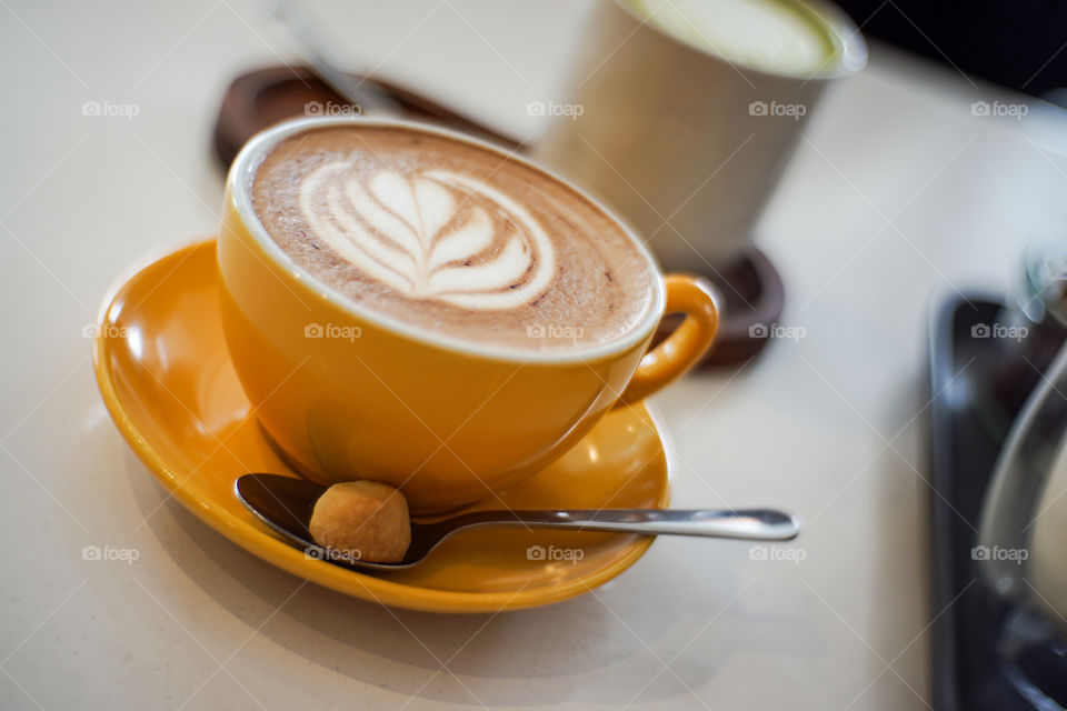 Cappuccino cup with spoon saucer