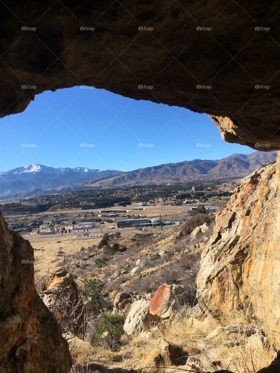 Looking at Pikes Peak out of a cave
