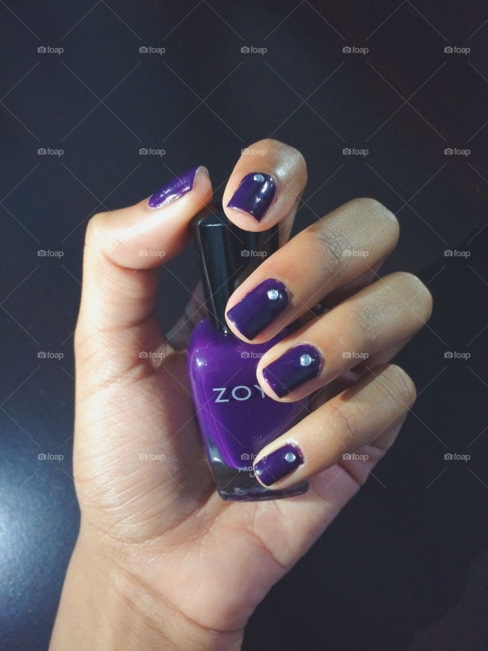 A dark purple with a pop of sparkle 