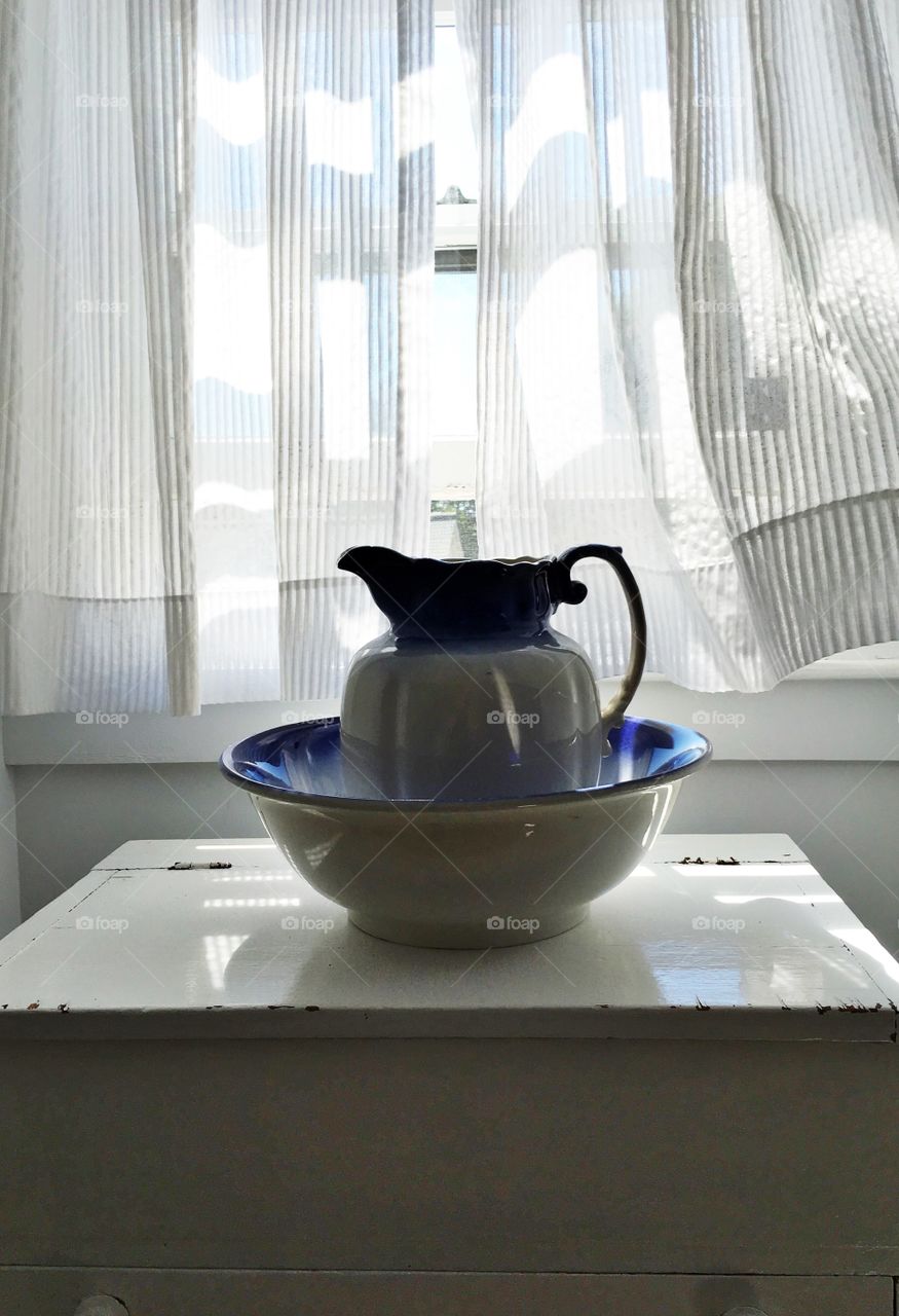 Wash jug in open window