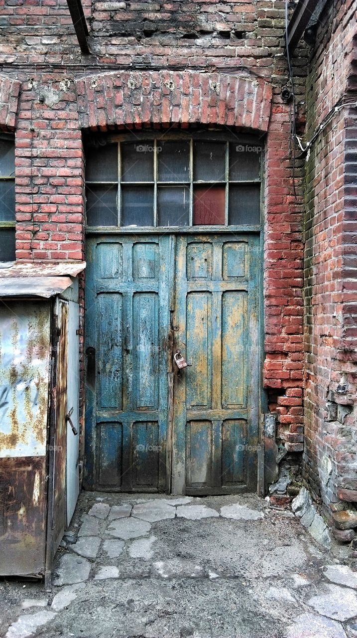 Padlock on an old door
