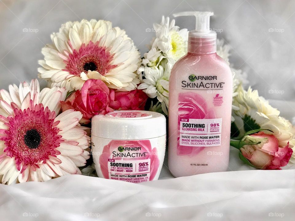 Garnier skin active products with flowers in background  