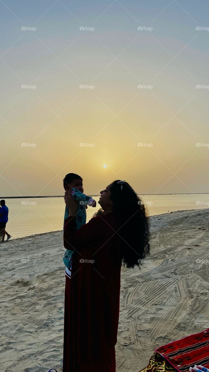 Mom and baby . Summer by the ocean 