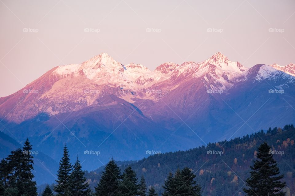 Beautiful sun rise shade on snow 