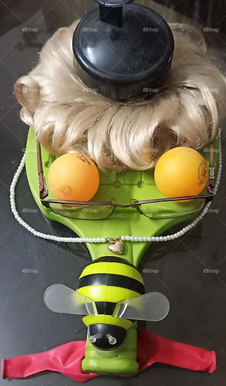 face of a clown that makes you happy and laugh out of waste materials.