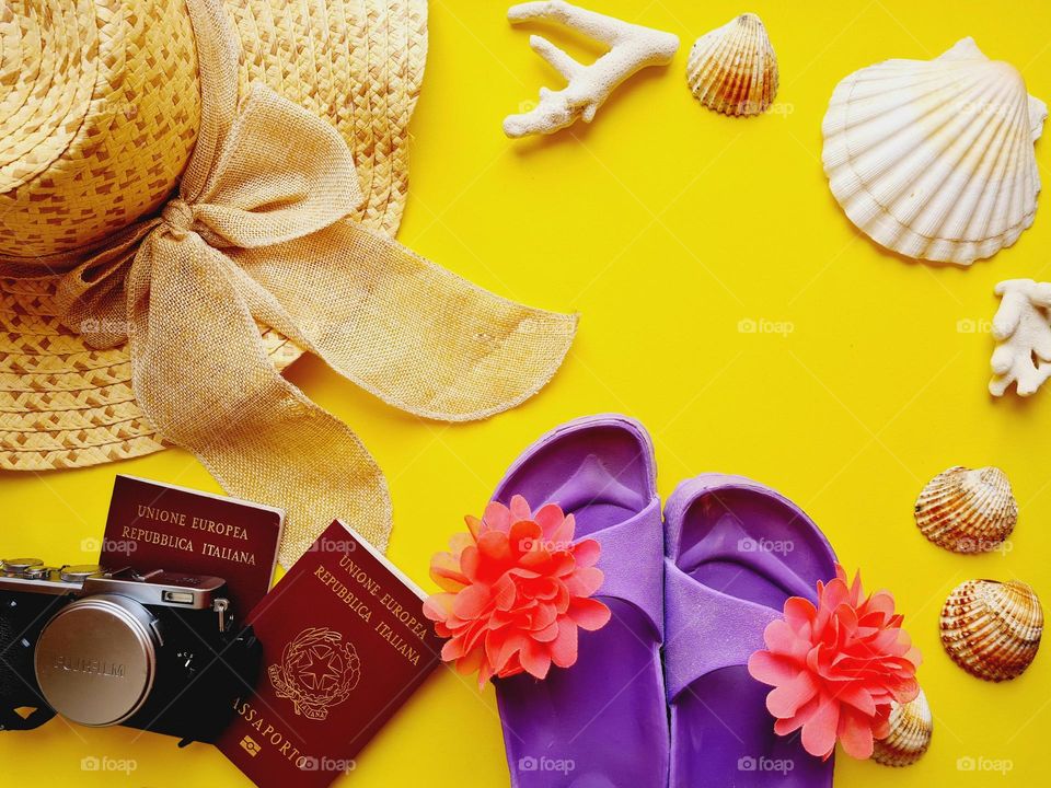 flat lay with travel and beach accessories