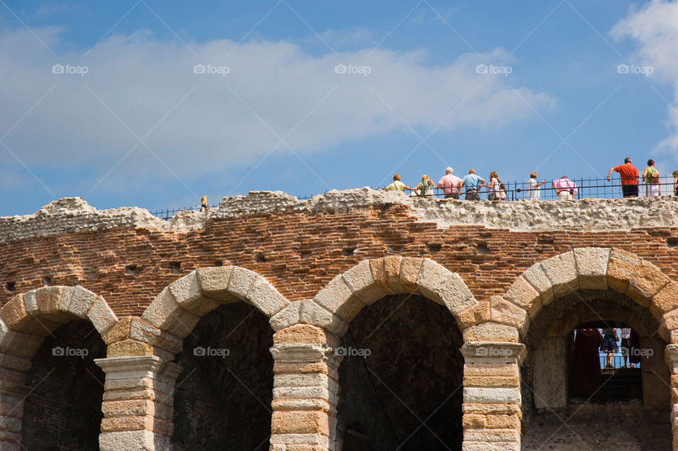 People on top of the colosseum of Verona, Italy