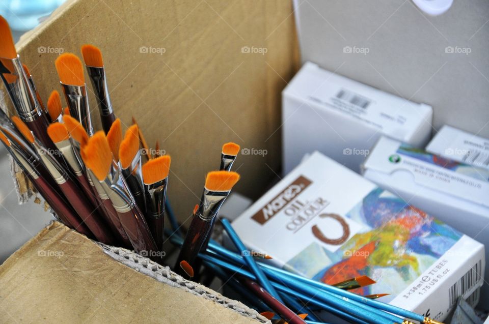 box with brushes and oil colours for painting