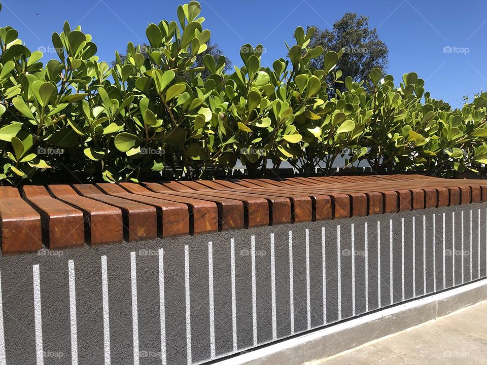 Seat shadow on the wall and a blue sky 