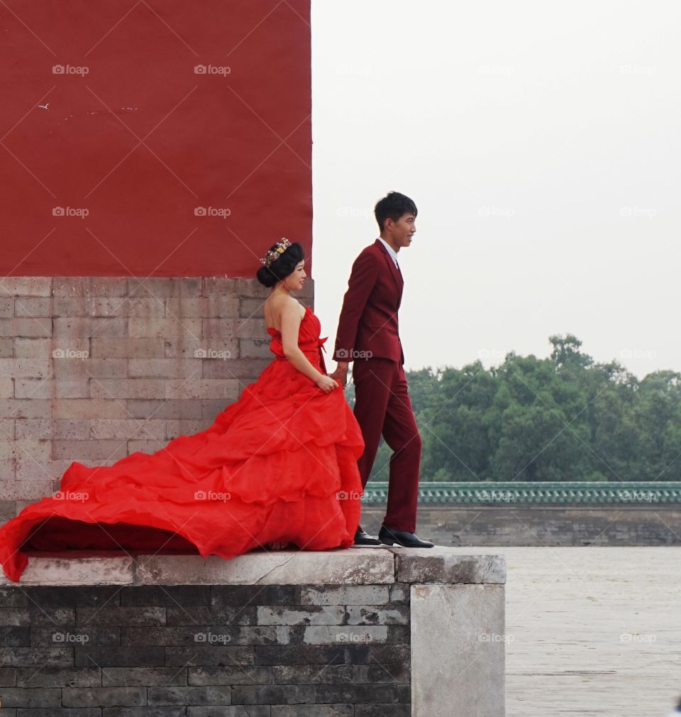just married. a chinese couple shooting photos for their wedding