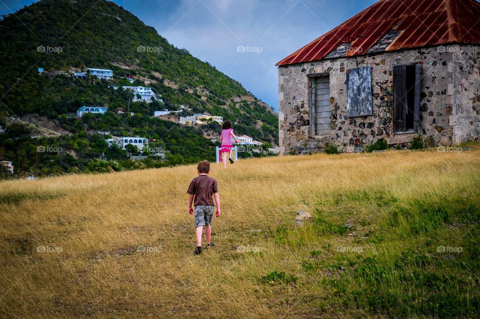 Running up to the ancient building 