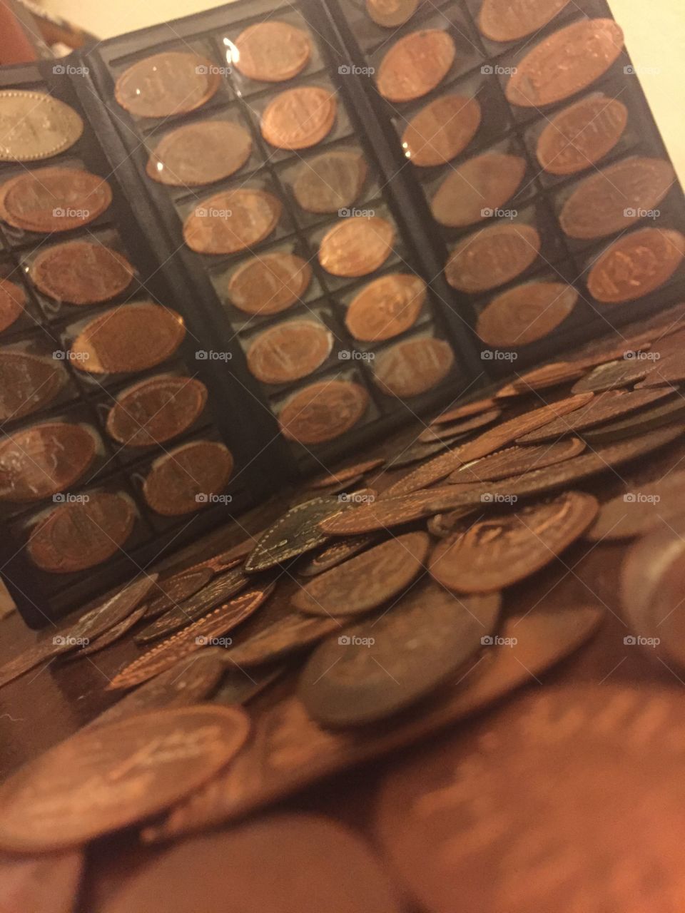 Scattered souvenir pennies from my sons many adventures 