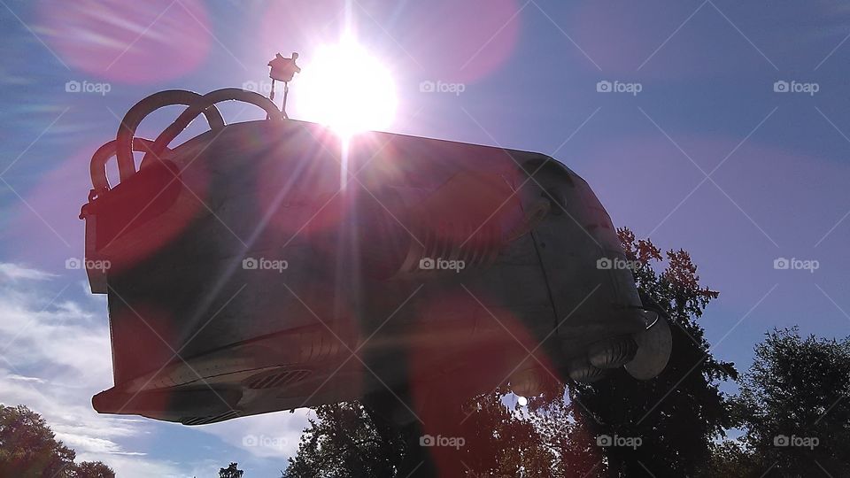 Alien spaceship sunrise. On at the park