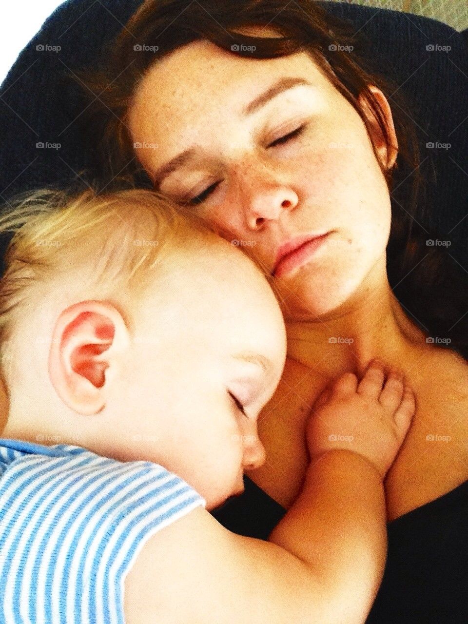 Loving mother and son taking nap!