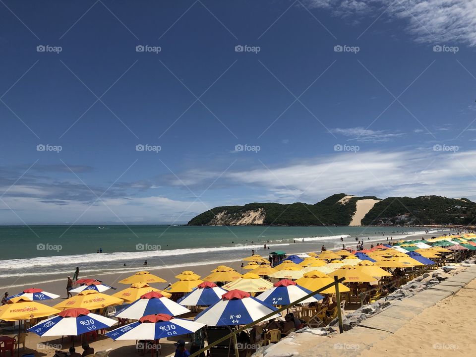 Ponta Negra beach in Natal, capital of Rio Grande do Norte State - the northeast state in Brasil. In the background, a famous tourist mark: Morro do Careca.