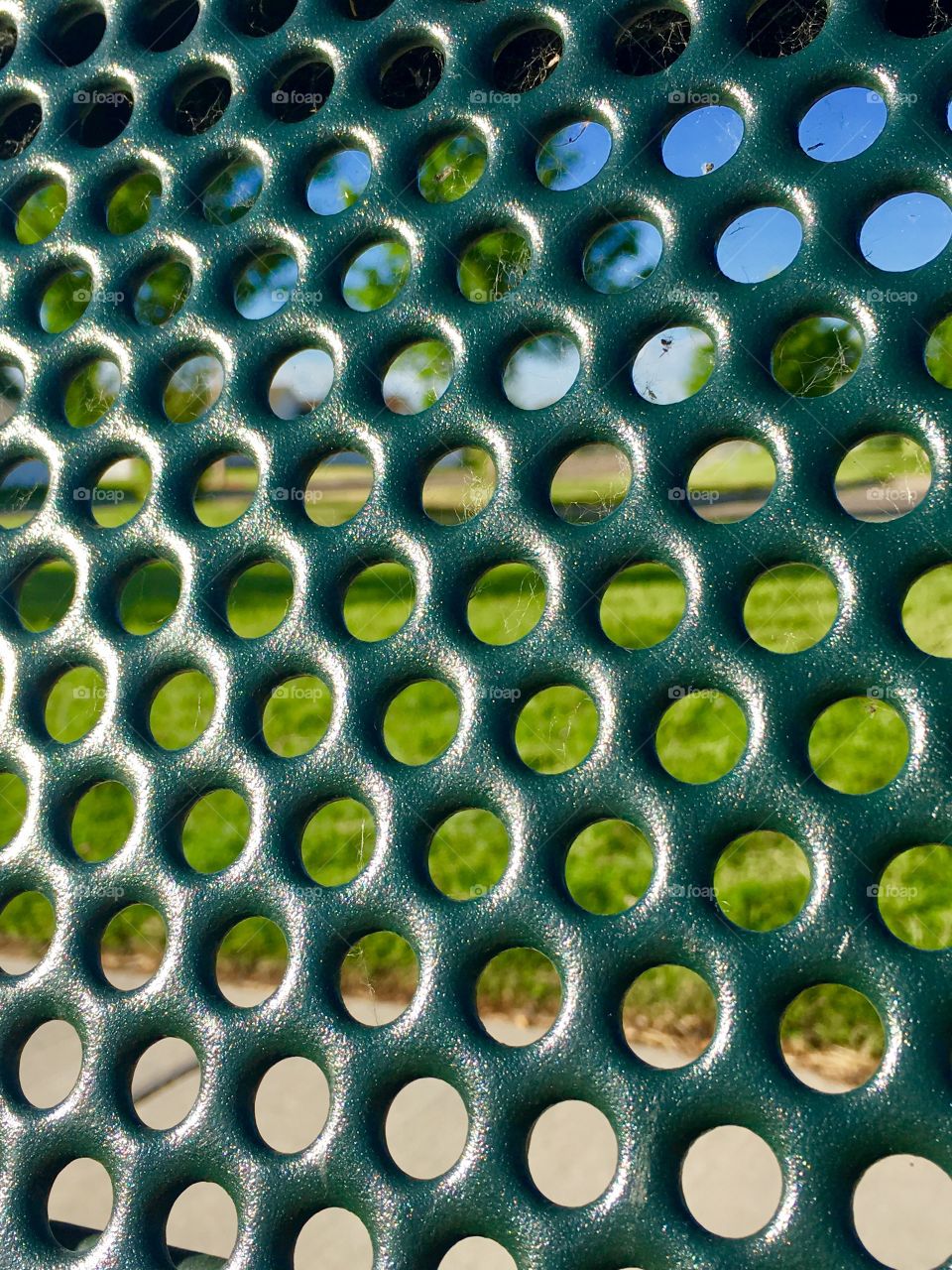 Bumpy. Lumpy. Rough. Pattern. Circles. Holes.