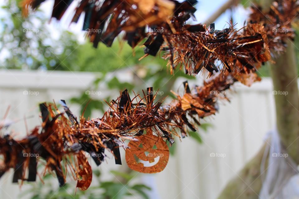 Fancy Halloween garland hanging outside 