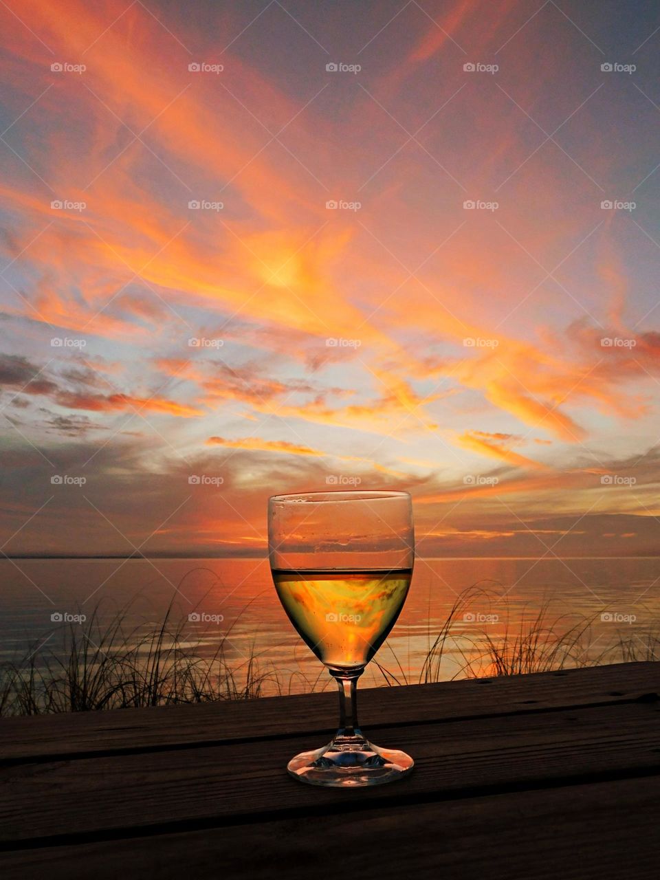 Sunset and a glass of wine- I wanted to create art, because I am always looking for ways to think outside the box when shooting sunsets! It doesn’t hurt if you’ve already had one 