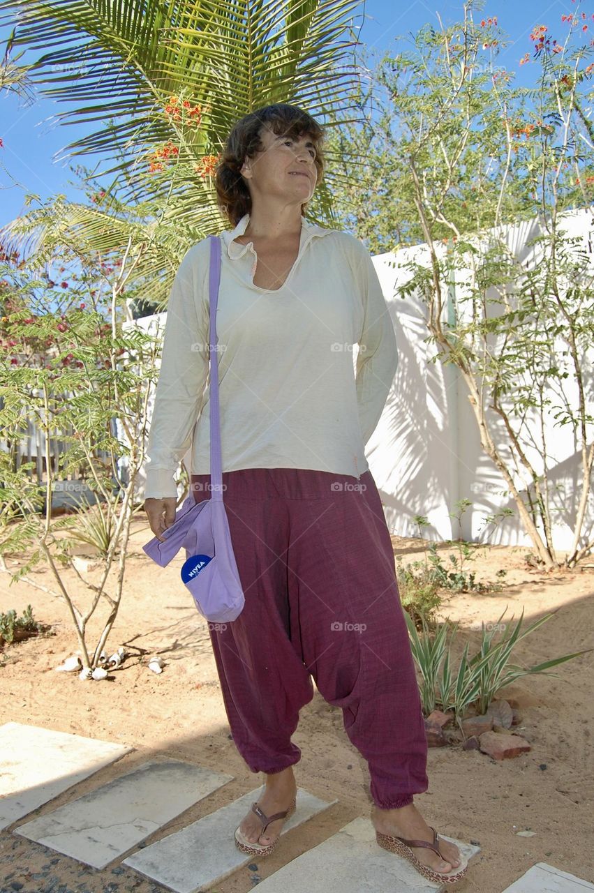 Woman with bag and nivea cream 