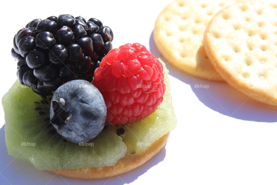 Close-up of fruit and crackers