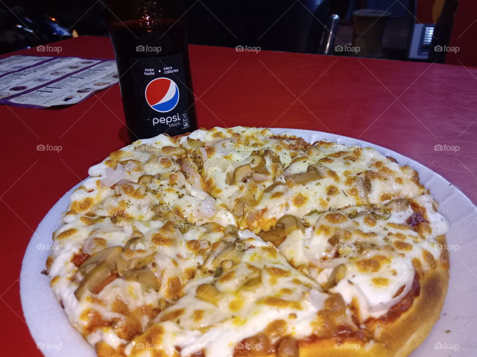 pizza with pepsi