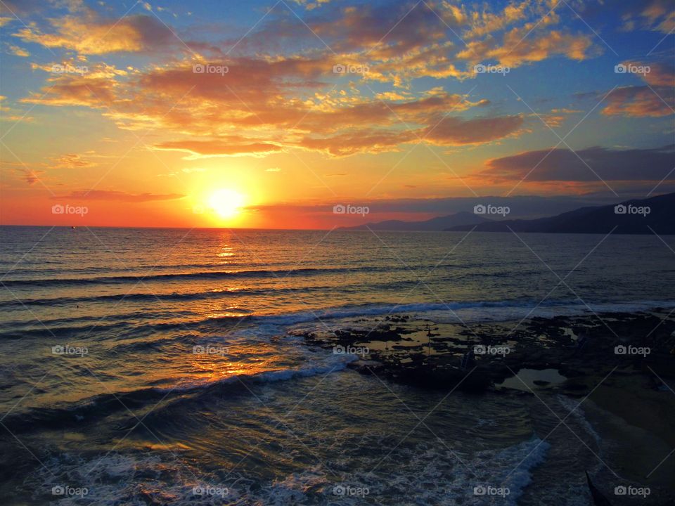 Idyllic view of sea during sunset