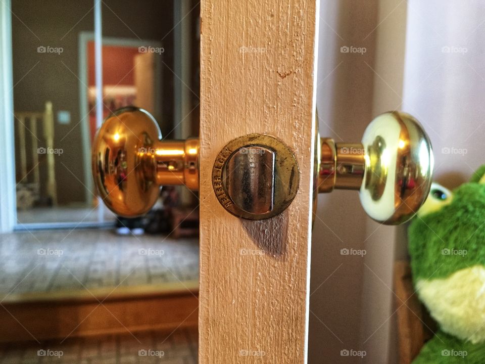 Two doorknobs, two sides