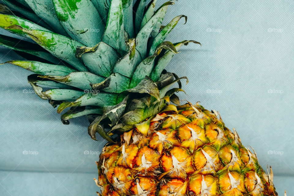 Juicy ananas on the white background 