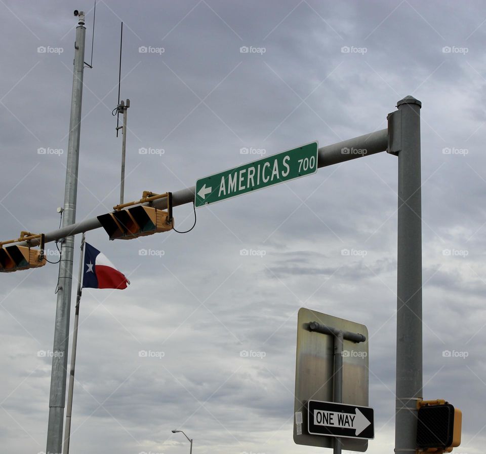 Street Sign : Americas and Texas Flag 