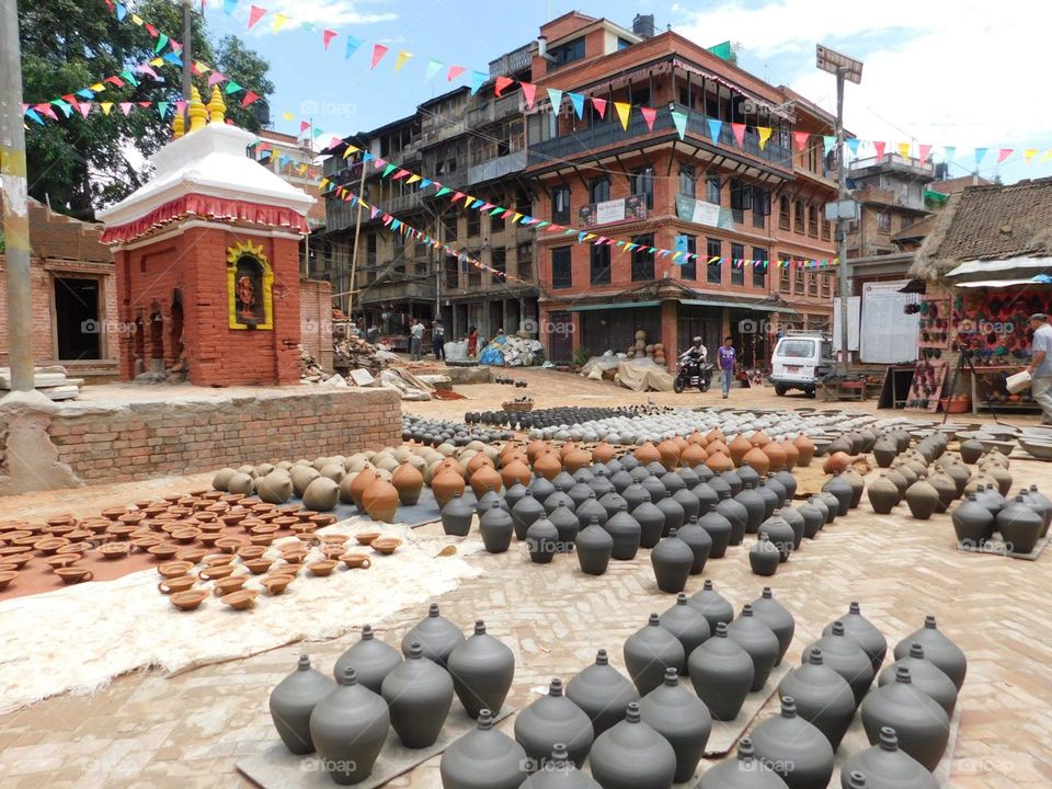 homemade pottery/ceramics on calm Asian city Square in Nepal