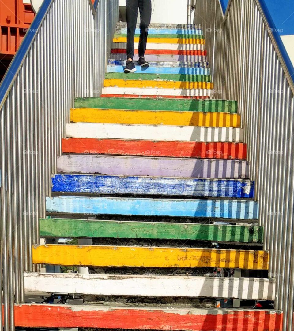 Clash of colors: a stairs of footbridge.