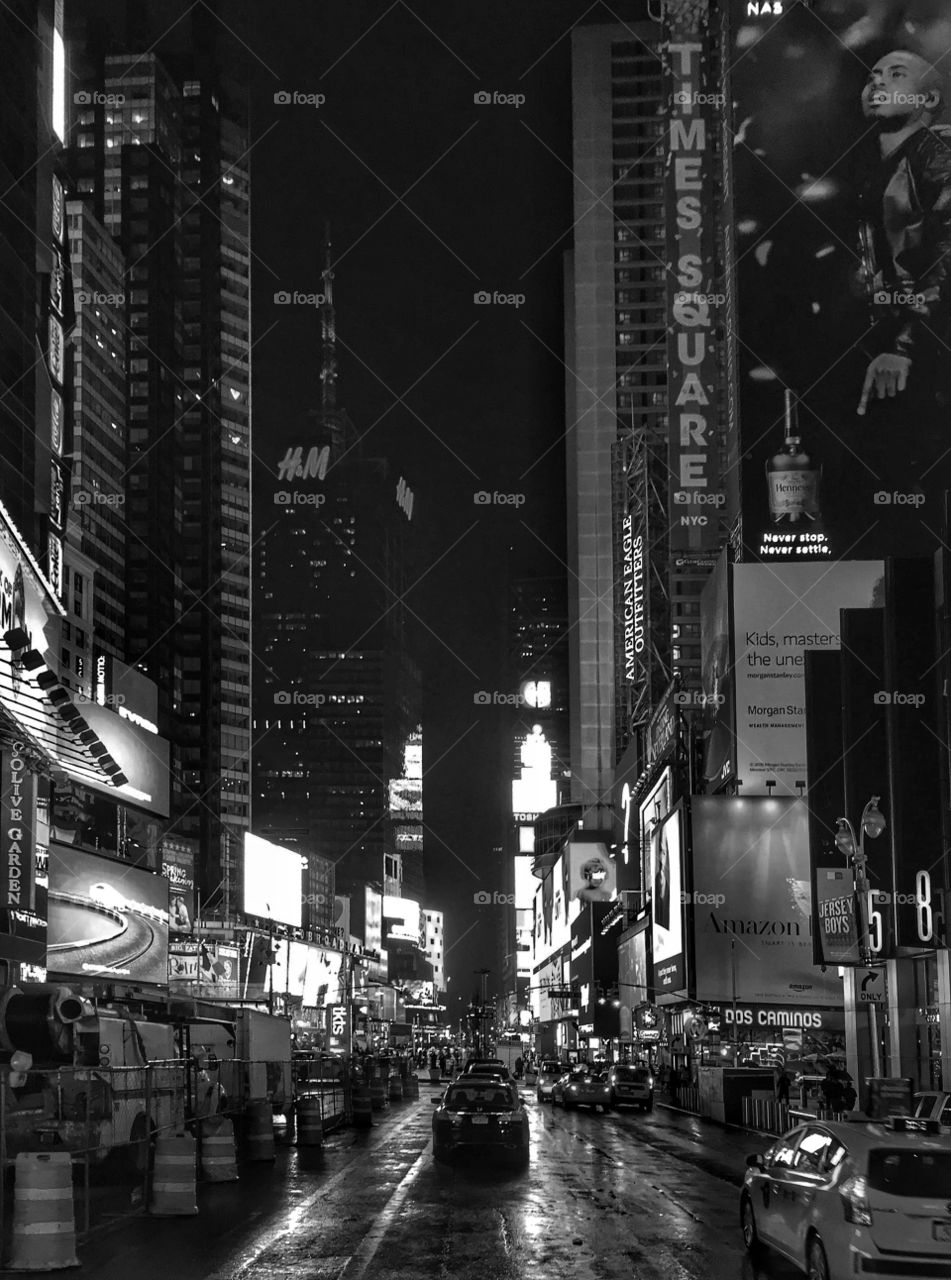 Times Square in New York City on a rainy night