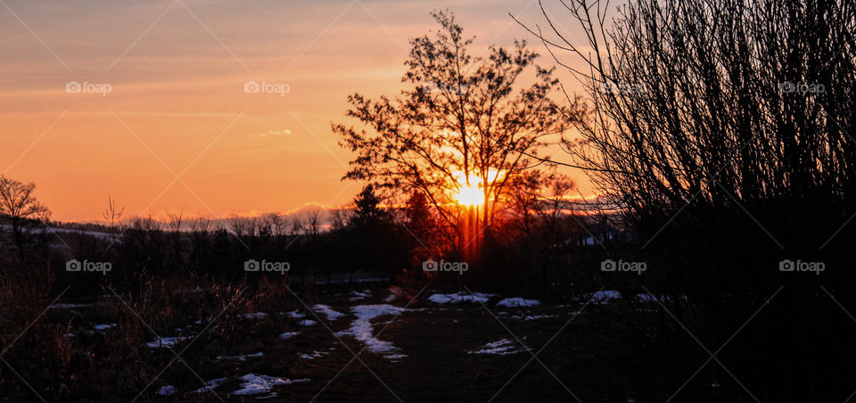 Beautiful landscape with an amazing orange sunset.