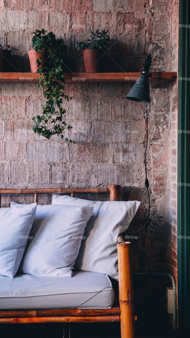 Wood and exposed brick give this living room a warm, rustic feel.