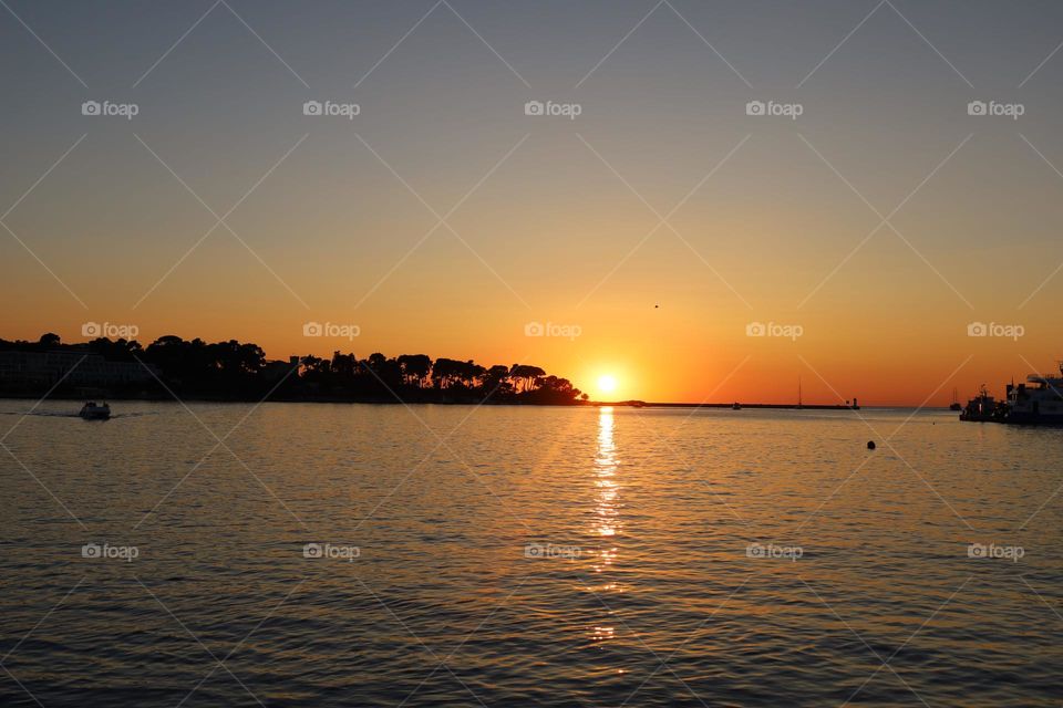 Sonnenuntergang in Poreč, Istrien, Kroatien