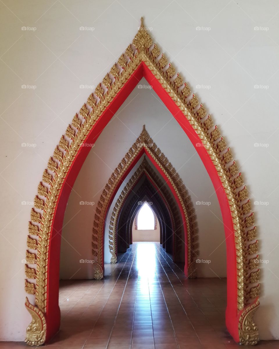Golden arch design on wall