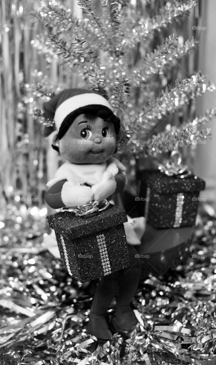 Black and white, girl, elf on the shelf with presents 
