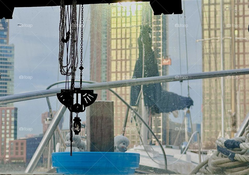 The view from „Salvation“, the „28 ft 1969 Luhrs“ that is home to me and my partner „Timothy Trespas“ changes with the time of day or year. The early rising sun is amplified by the glass facades of neighboring buildings. 2024. Hypnotic Productions