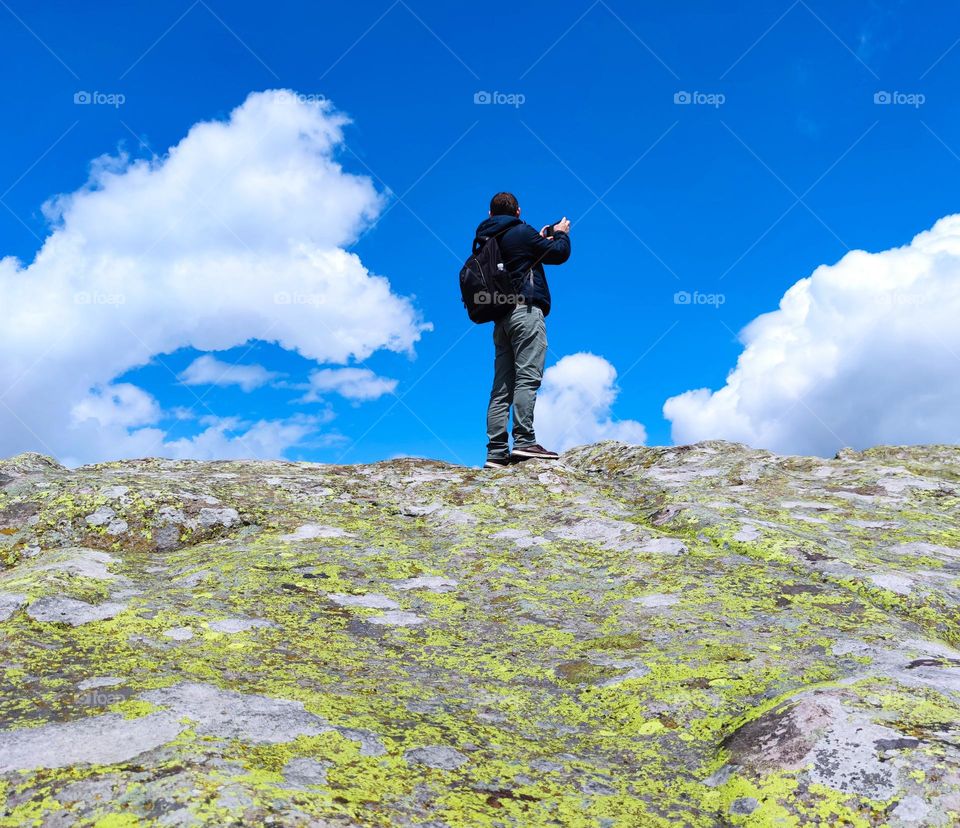 Touching the clouds and the blue sky