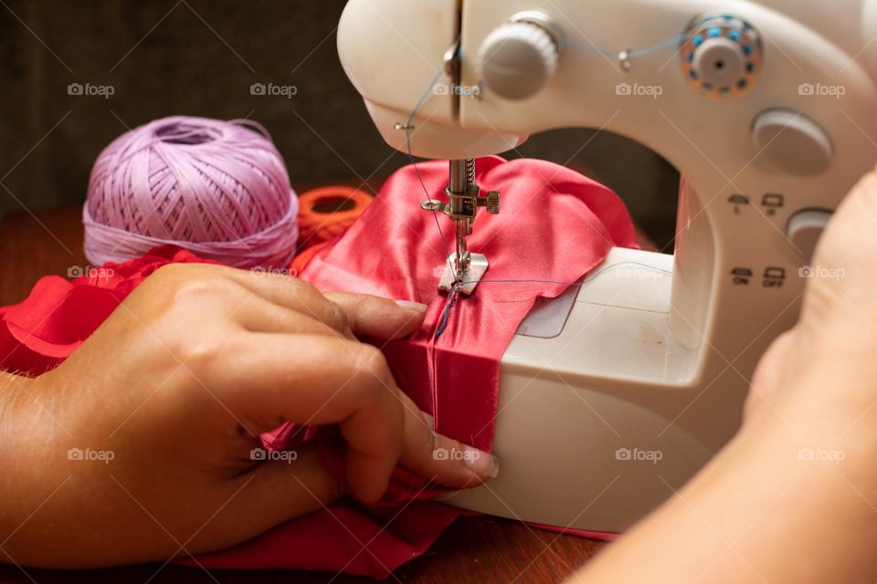 Working at the sewing machine